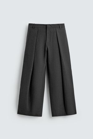 RELAXED FIT PLEATED PANTS