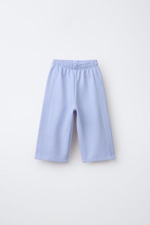 WIDE LEG INTERLOCK RAISED TEXT PANTS
