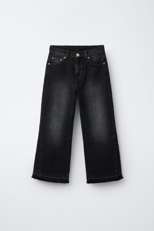 FLARED FRAYED JEANS