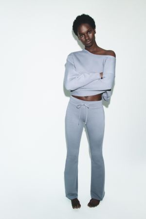 WASHED EFFECT FLARE PANTS