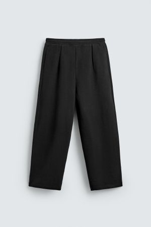 PLEATED WIDE FIT JOGGER PANTS