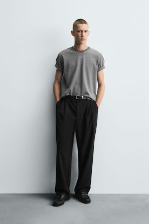 WIDE FIT PLEATED PANTS