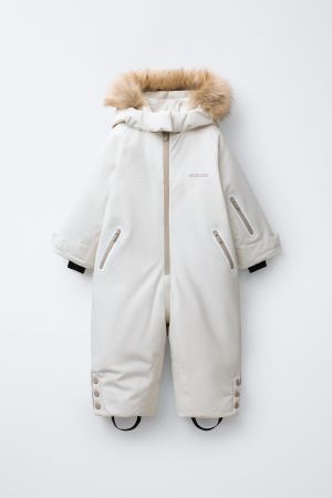 WATER RESISTANT AND WINDPROOF RECCO® SYSTEM SKI COLLECTION LONG JUMPSUIT WITH FAUX FUR HOODIE