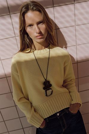 ASYMMETRIC HEM KNIT SWEATER