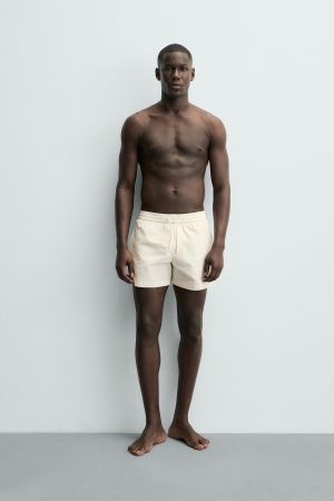 SEERSUCKER SWIM TRUNKS